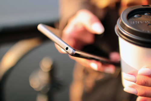 micro-moments-hands-coffee-smartphone